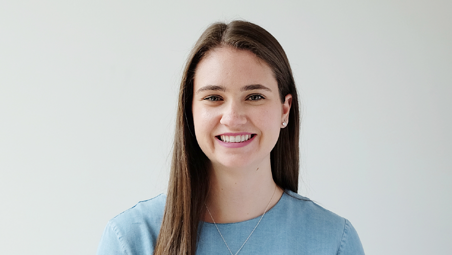 A woman smiling.