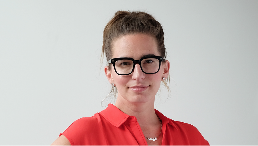 A woman in a red shirt.