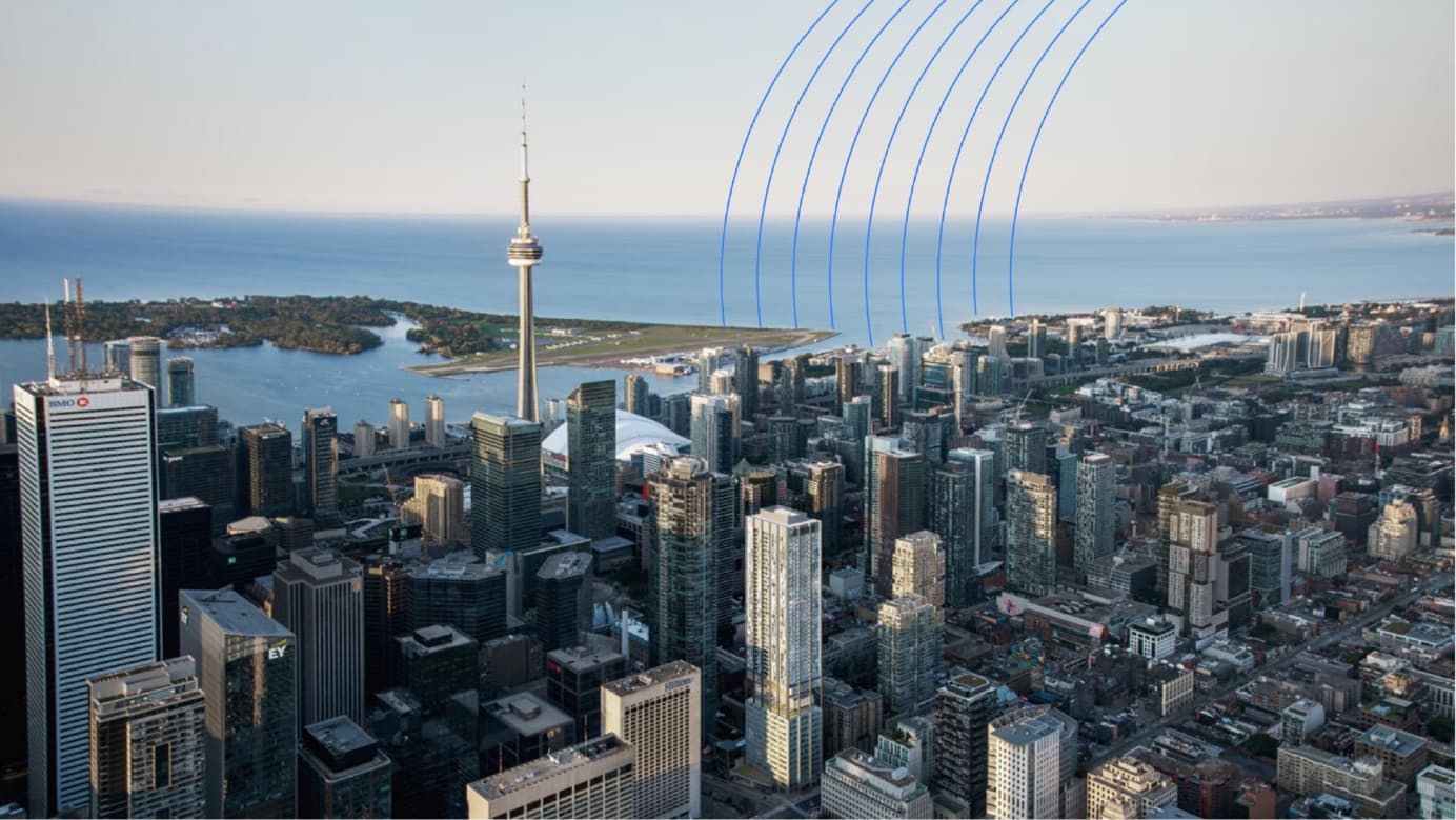 Aerial image of downtown Toronto with Lake Ontario in the background.