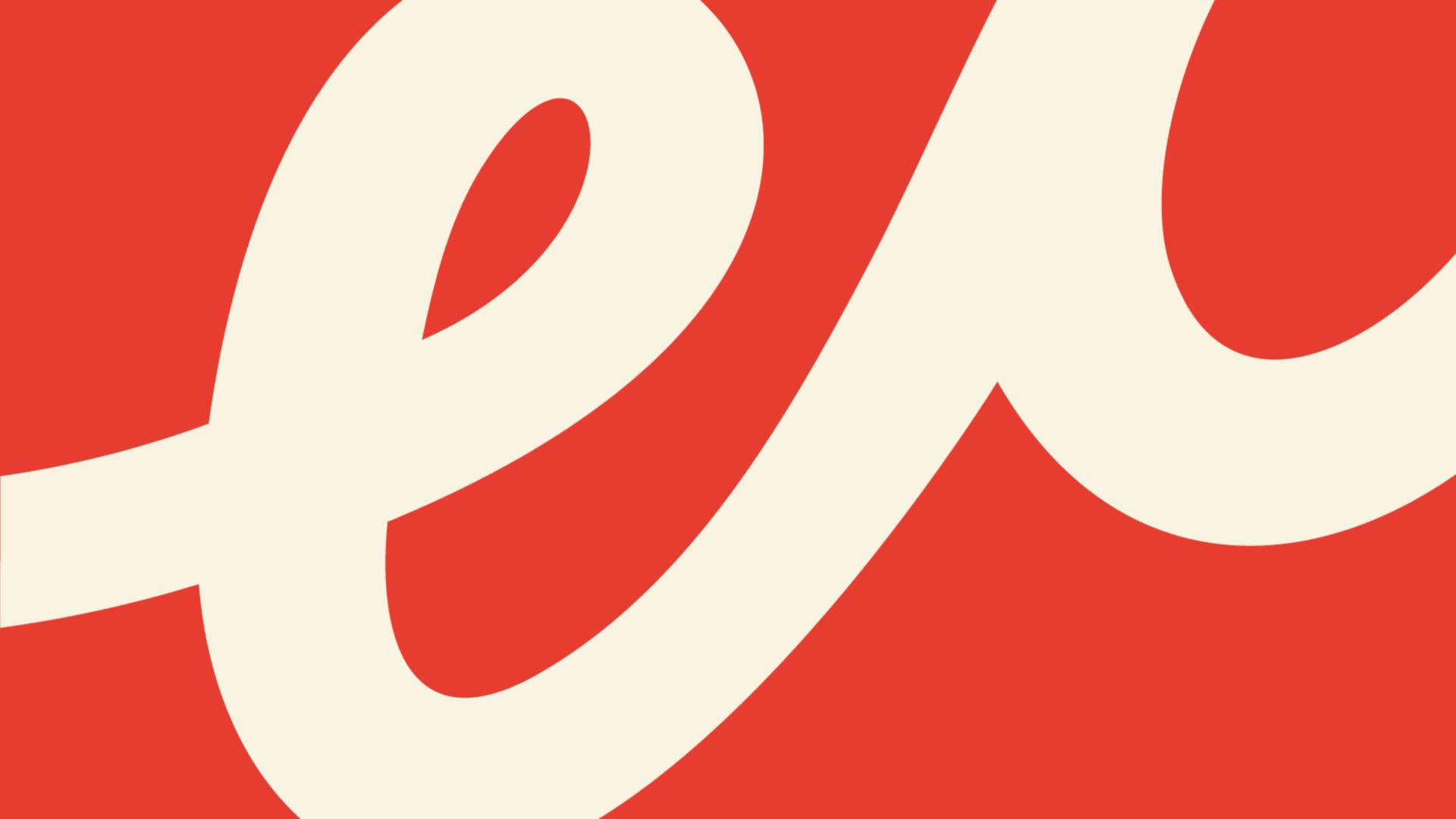 Close-up of the cursive letter “e” in the LiftED logo.