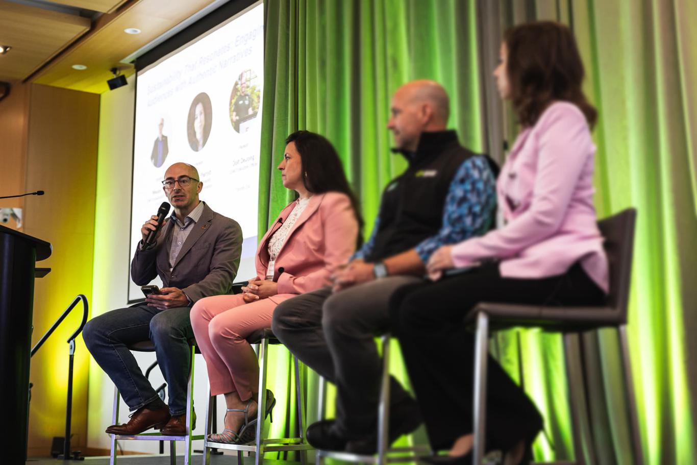 Works Design Chief Sustainability Officer and principal Wesley Gee speaks at the 2025 PPG Annual Forum as other panelists look on.
